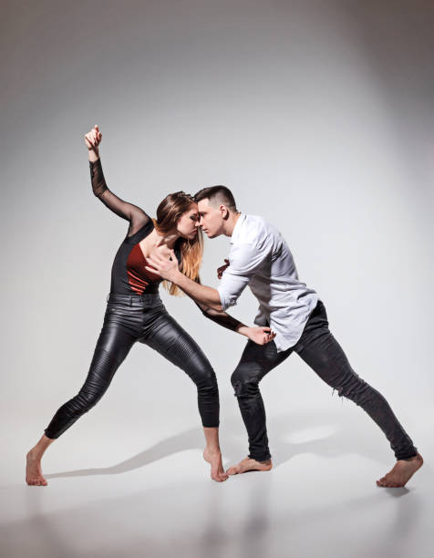 istock Two people dancing in contemporary stile 659984860