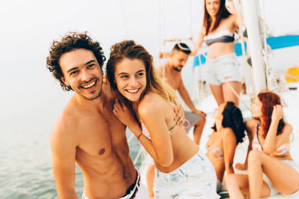 istock Happy couple on a yacht 659995012