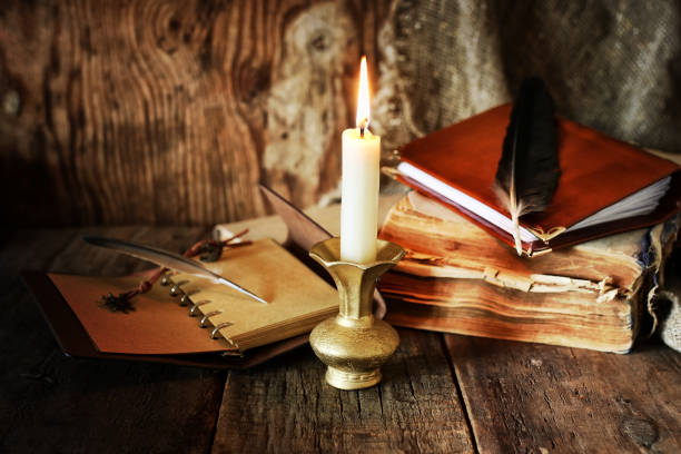 istock book pen candle romance 660013624