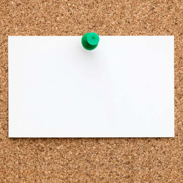 istock Blank Business Card Pinned to Cork Board 660014180