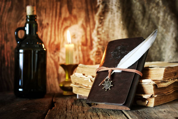 istock diary and feather with a bottle of rum 660032610
