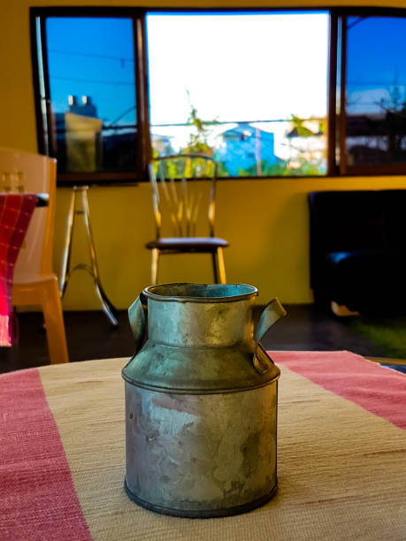 istock Old aluminum milk jug above on the table 660049778