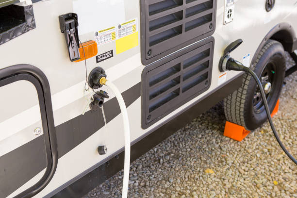 filling the water tank of a campervan