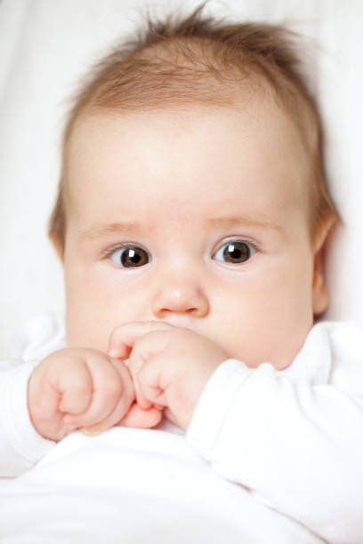 istock Baby - cute face closeup (up 5 months old) 660060036