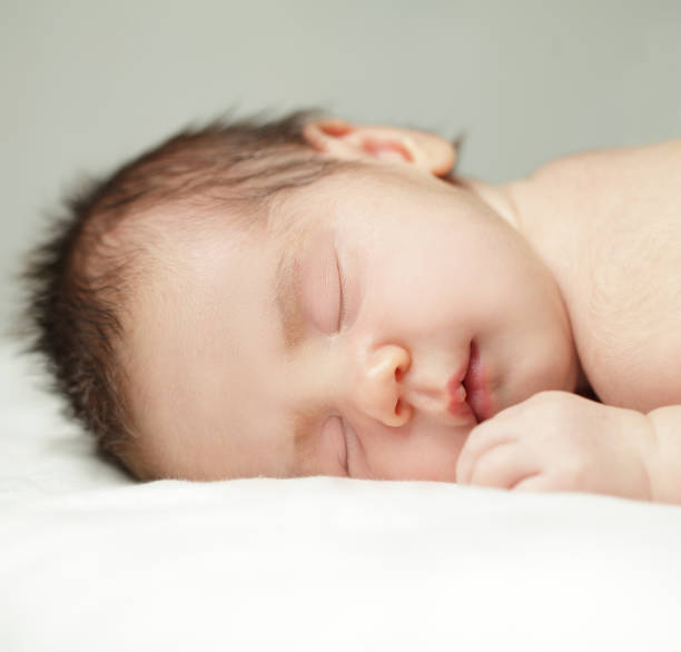 istock Newborn, sleeping baby close-up 660060064