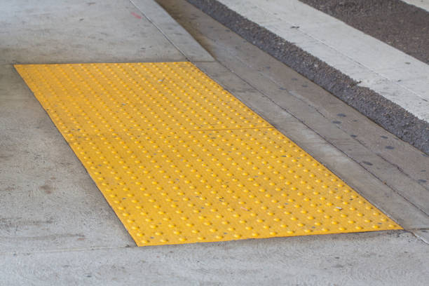 istock Tactile paving with textured ground surface with markings, indicators for blind 660060876