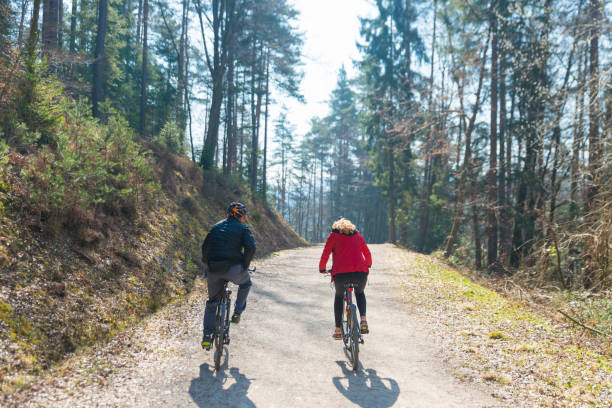 istock Couple Cycling Through Countryside Together 660078706
