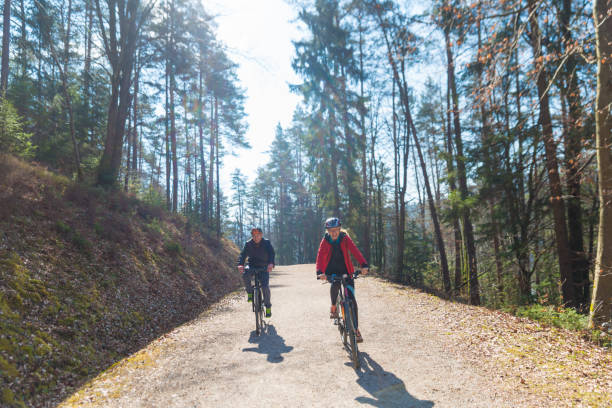 istock Couple Cycling Through Countryside Together 660078710