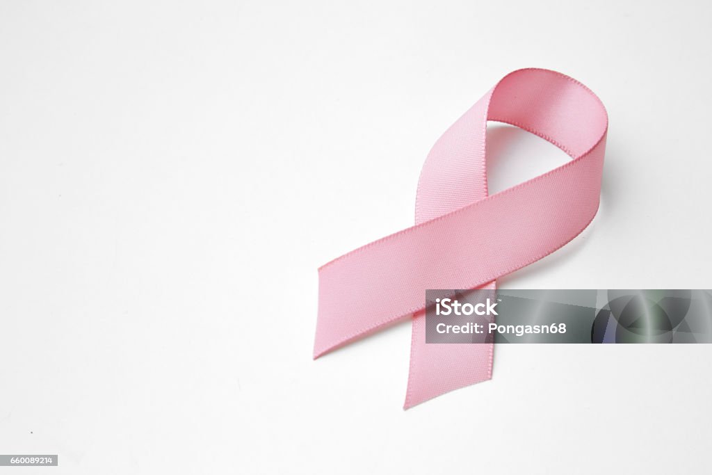 Pink breast cancer ribbon Pink breast cancer ribbon isolated on white Breast Cancer Awareness Ribbon Stock Photo