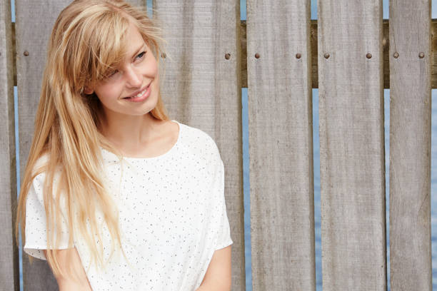 istock Smiling blond in dress 660118698