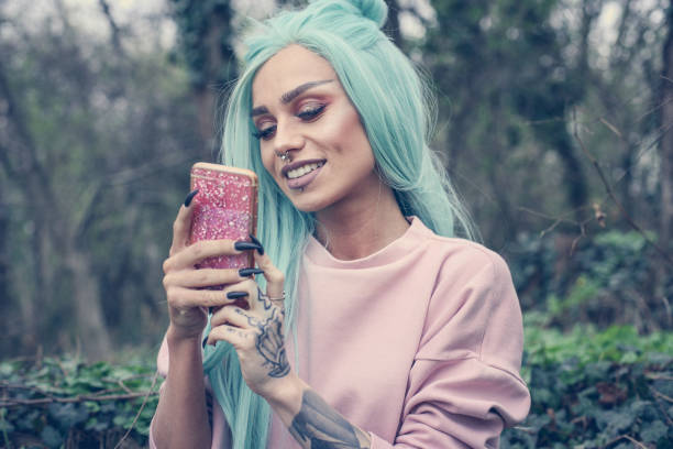 istock Girl with mint wig outdoor. 660138882