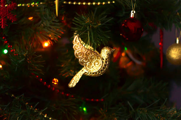 Happy New Year, Merry Christmas, celebration or holiday background concept : Christmas ornaments on gold glitter lighting background