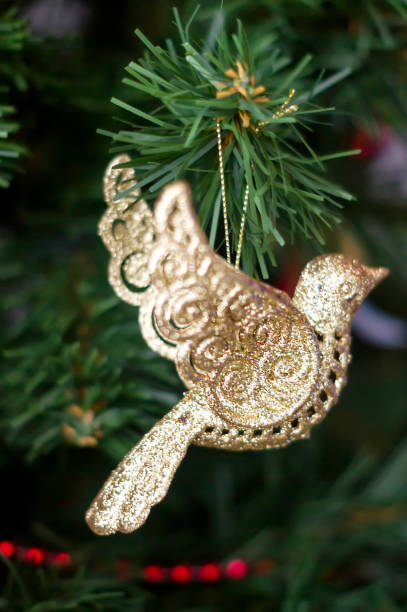 istock Christmas tree toy, golden bird 660142342