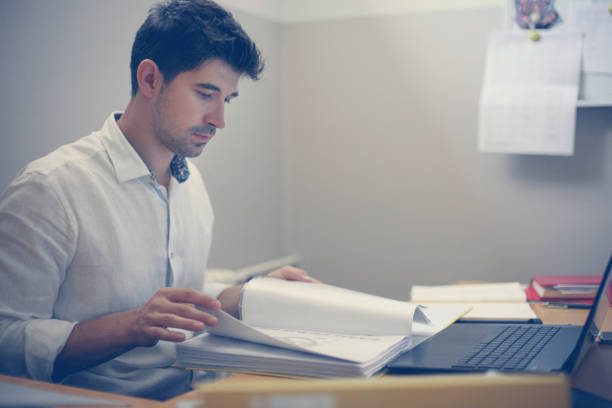 istock Businessman working at his desk. 660151230
