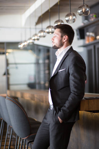 istock Handsome, young  businessman, in a bar, portrait 660151746