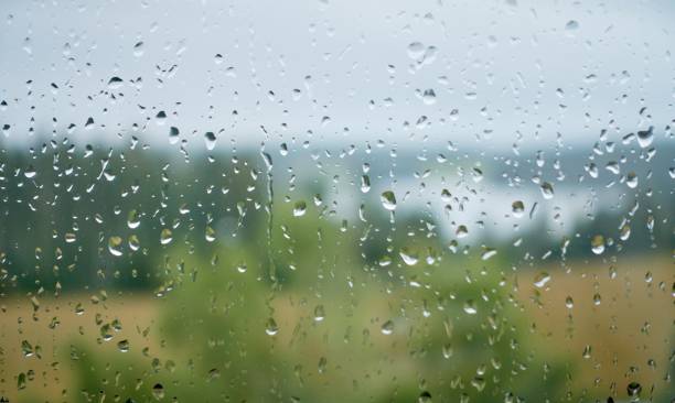 istock Water drops on wet window glass after the rain in summer 660181874