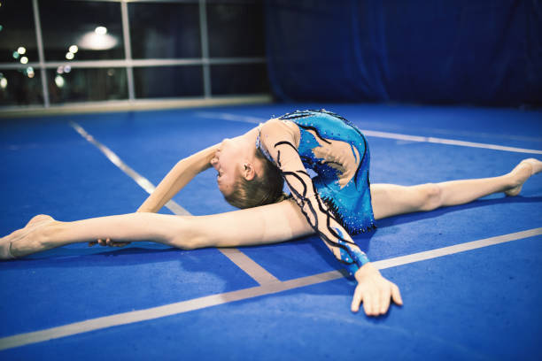 istock Girl is engaged in rhythmic gymnastics 660182020