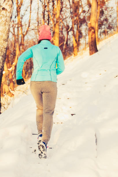 istock Girl exercising in winter 660204368