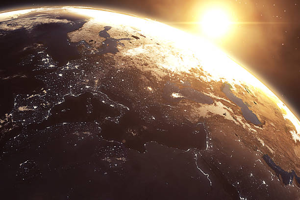 istock blue planet earth from space showing europe continent, globe world with blue glow edge and sun light sunrise on space in a star field, some elements of this image furnished by NASA 660206760