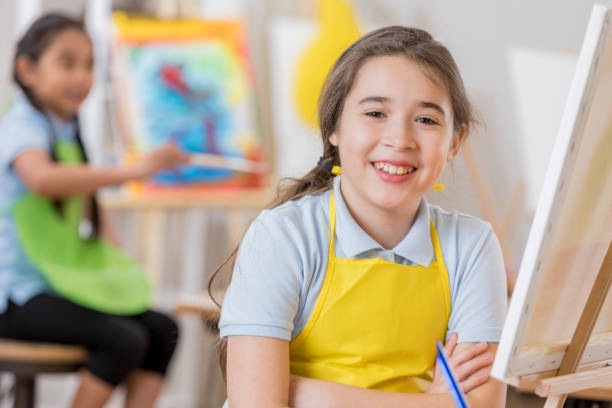 istock Cheerful young artist in art class 660223290