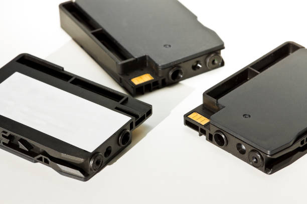istock Black plastic inkjet cartridges with white label for text insertion 660224990