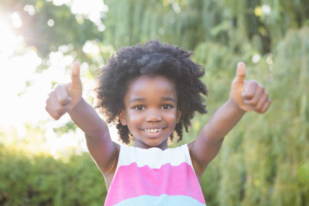 istock Smiling child with thumbs up 660231878