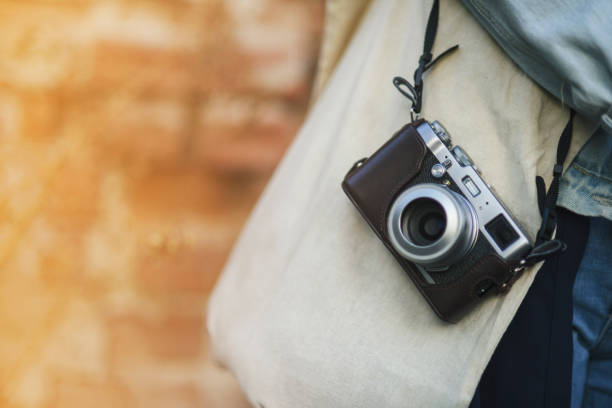 istock Girl with a vintage camera 660239602