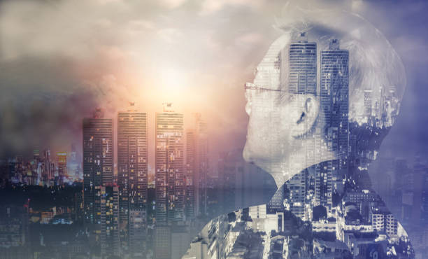 istock Double Exposure Businessman with skyscraper and sun 660246854