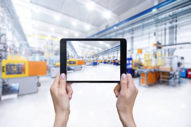 istock Futuristic machinery in production line & tablet 660249298