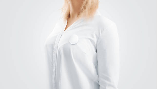 istock Blank button badge mockup pinned on the womans chest 660273912