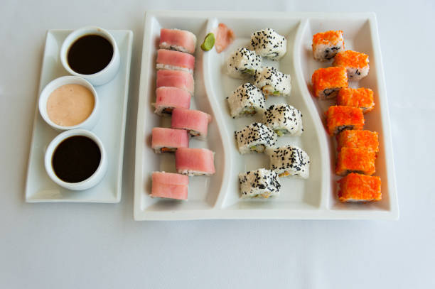 istock Sushi Assortment on white plate and white background 660286344