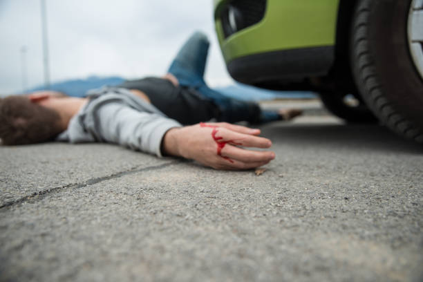 istock Traffic accident.Young man hit by a car 660297956