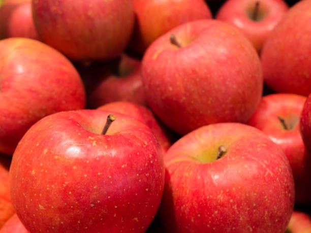 istock pired fresh red apples fresh red fresh apples lining the fruit and vegetable stores 660303672
