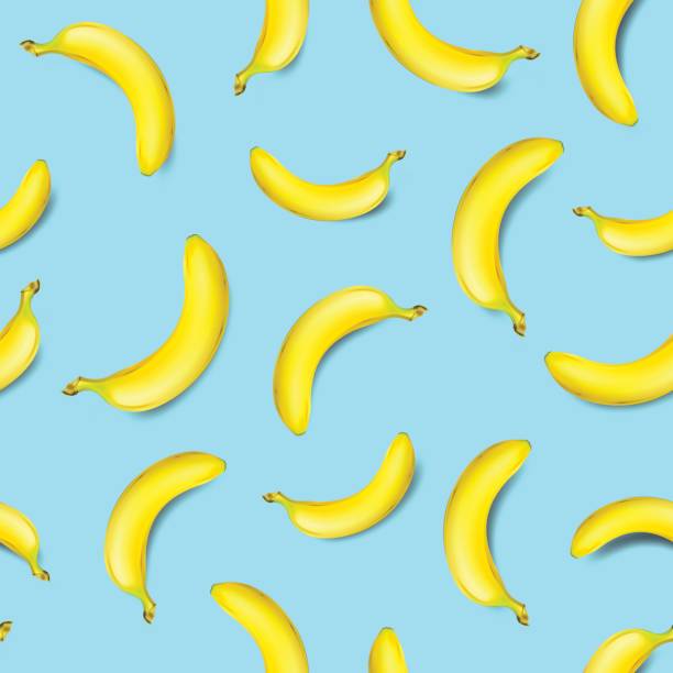 Seamless banana pattern on light blue background Seamless banana pattern on light blue background vector illustration banana patterns stock illustrations