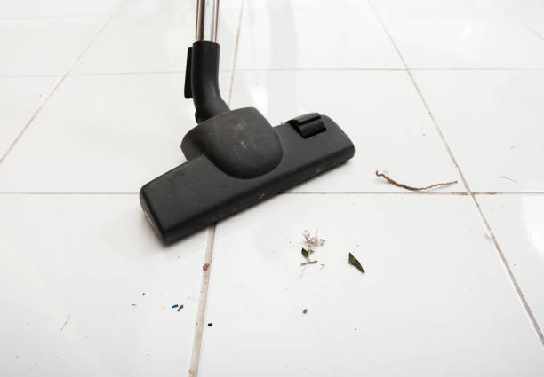 istock Vacuum cleaning dirt on a tiled floor 660316046