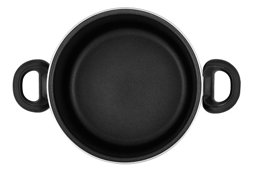 Casserole with ceramic coating, black handles, without a lid. View from above.