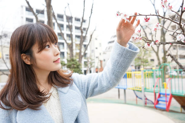 istock Young woman playing in the park 660319416