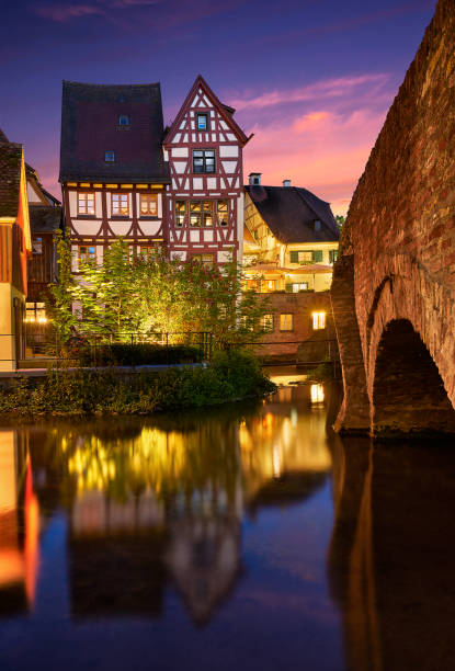 Ulm The old Fischerviertel Fishermen`s Quarter on the River Blau, with half-timbered houses, cobblestone streets, and picturesque footbridges. ulm germany stock pictures, royalty-free photos & images