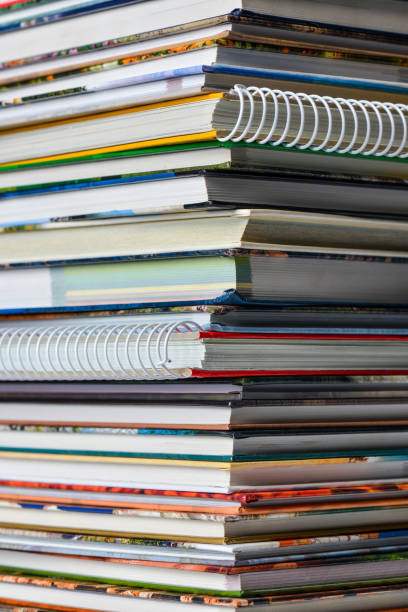 istock High angle view of many hardback books. Library or school 660324880