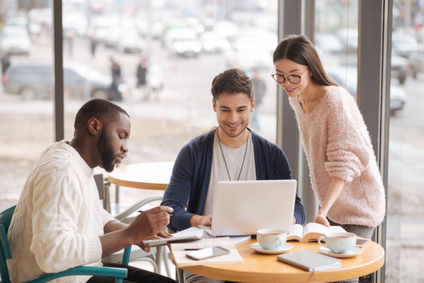 istock Group of young startupers brainstorming together 660325208