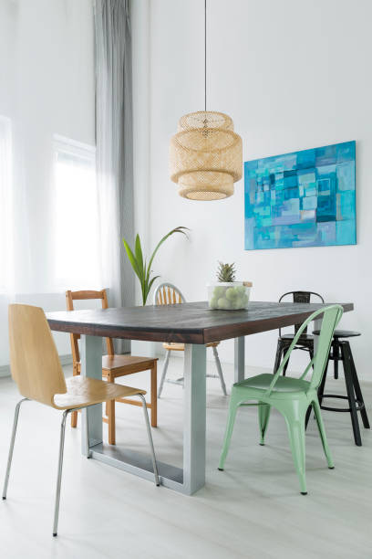 istock Dining room with trendy lamp 660325254