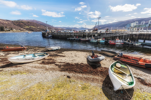Ullapool and its harbour, a classic picture-postcard Scottish Highlands village set amongst mountain scenery.