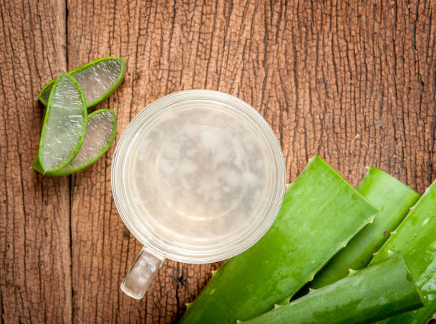 istock Aloe Vera Healthy drink on wooden background 660328982