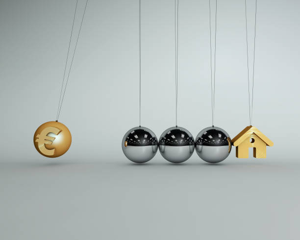 istock Newton ball and house 660329036
