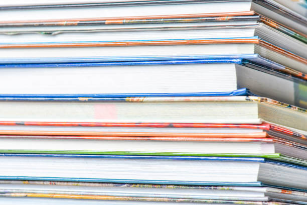 istock High angle view of many hardback books. Library or school 660333512