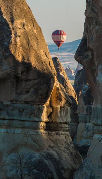 istock Hot-air balloon among rocks 660334630