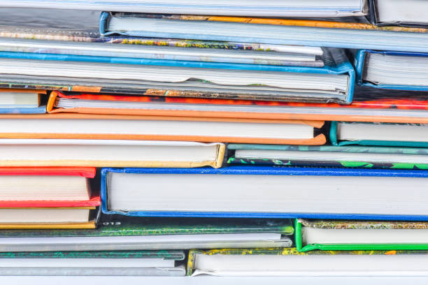 istock High angle view of many hardback books. Library or school 660339978