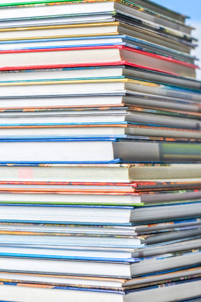 istock High angle view of many hardback books. Library or school 660340834