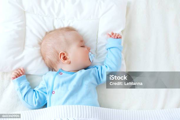 Baby Sleeping On Blue Blanket Stock Photo - Download Image Now - Baby - Human Age, Sleeping, Pillow