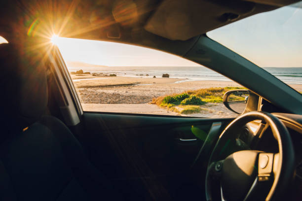 Interior view of a car parked at a beach